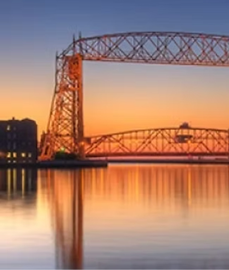 Duluth Aerial Lift Bridge at sunset over Lake Superior
