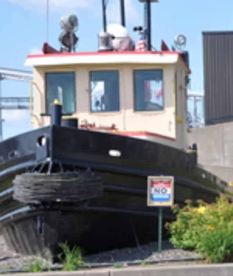 Working tugboat moored in a Lake Superior harbor