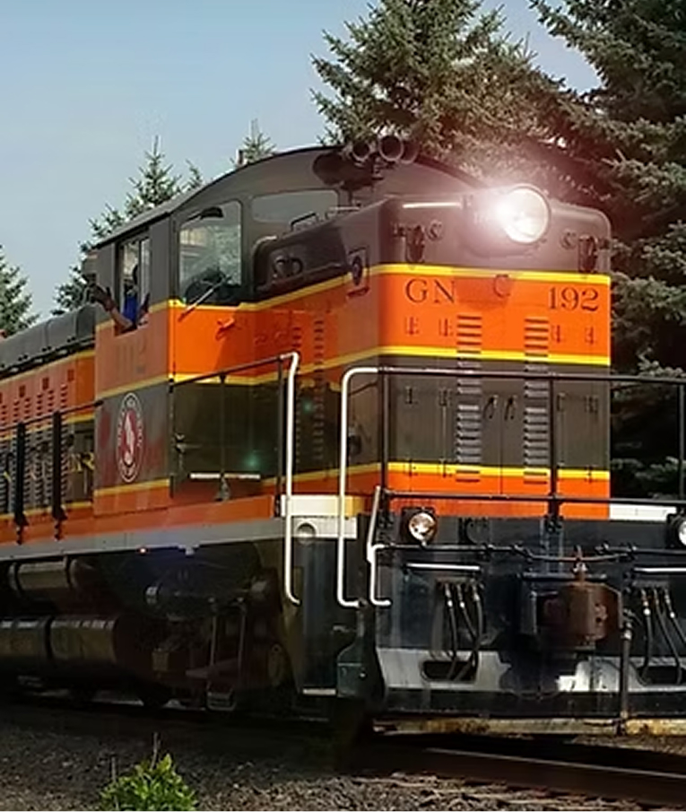 Vintage North Shore Scenic Railroad locomotive on the tracks near Two Harbors